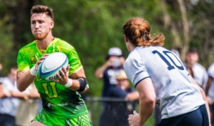 George Phelan takes a pass against Queens University. Photo Life University Rugby.