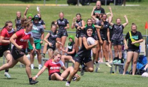 Hero of the day: Kanani Watts on her way to her third try. Alex Goff photo.