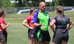 Referee Jeff Noe explains himself at the Girls HS National Championships. Alex Goff photo.