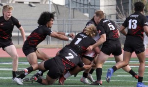 Herriman tacklers swarm in. Tonia McPeak photo.