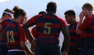 Herriman huddles up. Alex Goff photo.