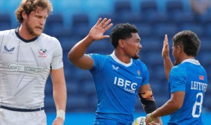 Samoa celebrates and Joe Schroeder doesn't. Mike Lee KLC fotos for World Rugby.