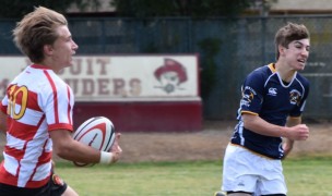 Jesuit found some space after giving up the opening try. Photo Curtis Popp.