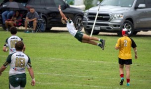 Lane O'Brien soards in for a try for Woodlands. Richard Clarke photo.