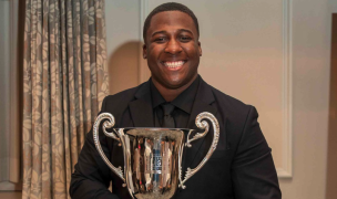 Larry Williams with his Rudy Scholz Award trophy. Photo Derrick Meneken for Washington Athletic Club.