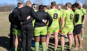 Life players huddle up. Alex Goff photo.