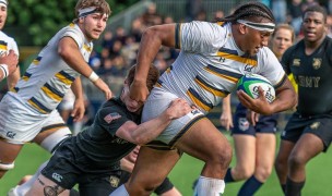 Lone Toailoa charges ahead For Cal against Army. Guy Warren photo