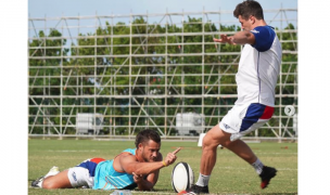 Will Magie kicks and JP Eloff holds as they train in Bermuda for the Ohio Aviators. Photo from Instagram.