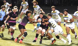 Marian's JD Farrell makes a tackle versus Rio Grande Saturday. Photo Marian Rugby.