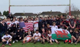 Marin and Llantwit Maor players hang out after the game. 