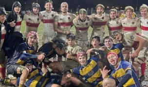 Marin, in white and red, with Villorba in the mud in Treviso.