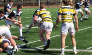 Marty Lenihan takes the ball up against Notre Dame de la Salette. Alex Goff photo.