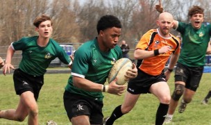 Jeff Marshall runs for his first try.  Ben Jacobs, Caine Coleman, and Bryce Morris are in support.