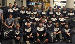 Mystic gathers at Logan Airport to fly to Italy.