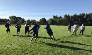 Neuqua Valley working on their handling skills as touch rugby returns to Illinois. 