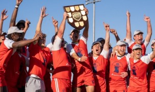 The New England Red players celebrate.