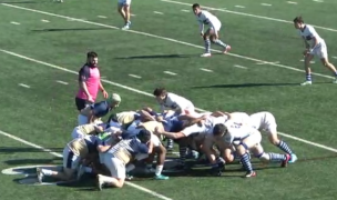 NOLA Jesuit in white scrums down vs Dallas Jesuit on Saturday.