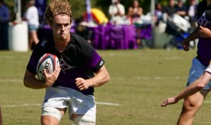 Pat Conley takes it forward for Furman. Buster Kennett photo.