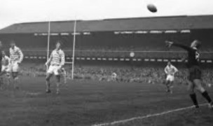 Dawkins throws in to the lineout in the 1959 Varsity Match.
