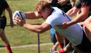 Queens University scoring a try.