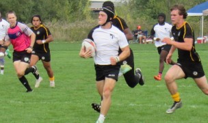 With their football players looking on from the sidelines, Penn HS won the Indiana fall 7s in 2021. Alex Goff photo.