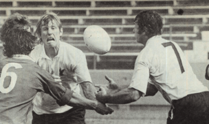 Skip Niebauer and Jeff Lombard (#7) battle for a loose ball with Joe Donaldson of Canada in 1979. Photo Rugby Magazine
