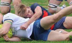 Tackle time Saint Mary's vs Trinity Western. Photo courtesy Saint Mary's College Rugby.