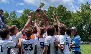 The Hermits raise the trophy. Photo Rugby New Jersey.