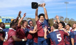 Maxi Testero holds up the Upstate Challenge Bowl trophy at the CRAA Fall Classic.