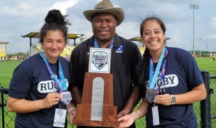 Tom Waqa and his players celebrate winning the 2022 D1 championship. Photo BYU Women's Rugby.
