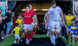 Tomas Appleton over Portugal and Greg Peterson of USA lead their respective teams out.
