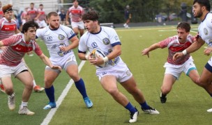 Tomasso Lorenzetti finds some space. Photo Marian University Rugby.