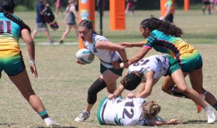 Girls action at the Tropical 7s. Alex Goff photo.