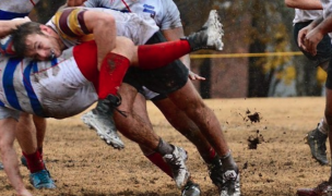 Tyler Glave making a tackle for Central Michigan. 