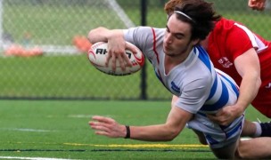 Brabo goes in for UMass-Lowell. Denise Sweeny photo.