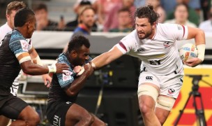 Danny Barrett gets some attention from the FIjian team. Mike Lee KLC fotos for World Rugby.