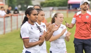 Zack Test and Falcons players on the sideline during the EAAST 7s.
