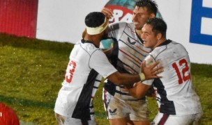 Bryce Campbell and Tavite Lopeti congratulate Christian Dyer. Photo World Rugby.