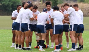 USA backs hudle up during training. Calder Cahill photo for USA Rugby.