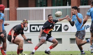 USA U23s in blue vs UXI XV in black. Photo courtesy UXI Sport.