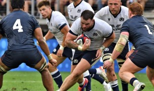 Vili Helu, left #4, and Jack Oscar, right #1, work to make a tackle against Scotland last summer. Both return to the USA roster.