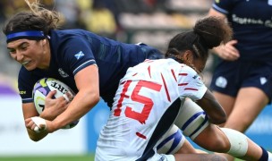 Scotland's Emma Wassell is tackled by Bulou Mataitoga in Friday's match. Photo by Johan Rynners World Rugby via Getty Images. 