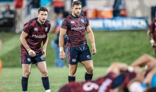 Bruce Campbell, right, and Will Magie watch the scrum take care of business. USA Rugby photo.