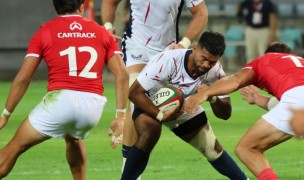 Tavite Lopeti getting some attention against Portugal last August. The Eagles and the Lobos tied, Calder Cahill photo.