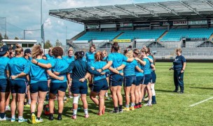 The USA women huddle up the day before the game.