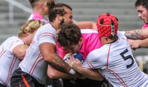 Davenport defenders warm around a Wheeling ballcarrier. Photo Terry Hancock Photography.