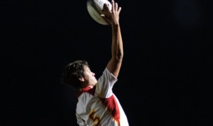 Will Boyer goes up for a lineout ball for Cathedral.