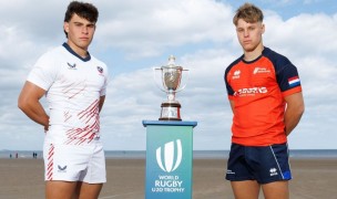 USA co-captain Dom Besag and Netherlands captain Kit Temperley pose with the trophy. Photo by Ross Parker / SNS Group