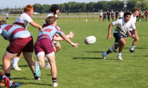 Xavier gets the ball out. Alex Goff photo.