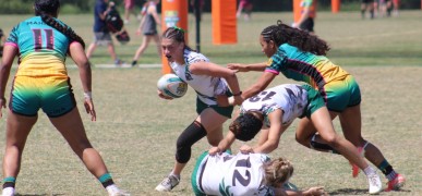 Girls action at the Tropical 7s. Alex Goff photo.